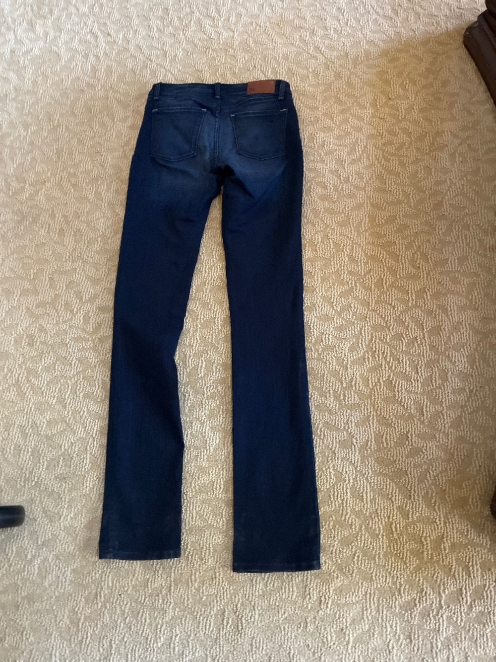 Woman’s straight leg blue jeans